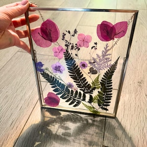 Pressed Flower Art in Glass Frame | Hanging Botanical Sun Catcher | Real Dried Flower Wall Decor | Transparent Window Hanging Frame